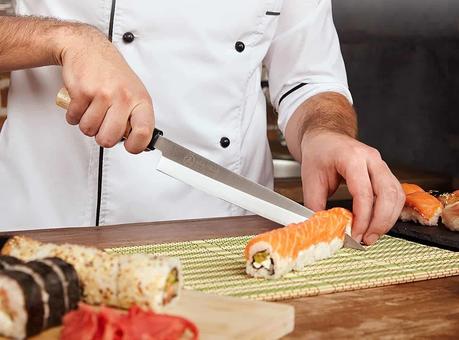 Best cheap sushi knife- Lucky Cook Sashimi Sushi Knife 10 Inch being used