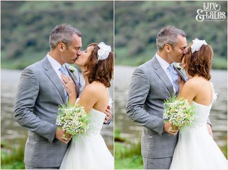 Bride and groom kiss at Lake Buttermere wedding