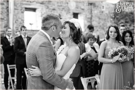 First kiss at New House Farm wedding in the Lake District