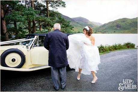 bride gets out of car at Lake Buttermere