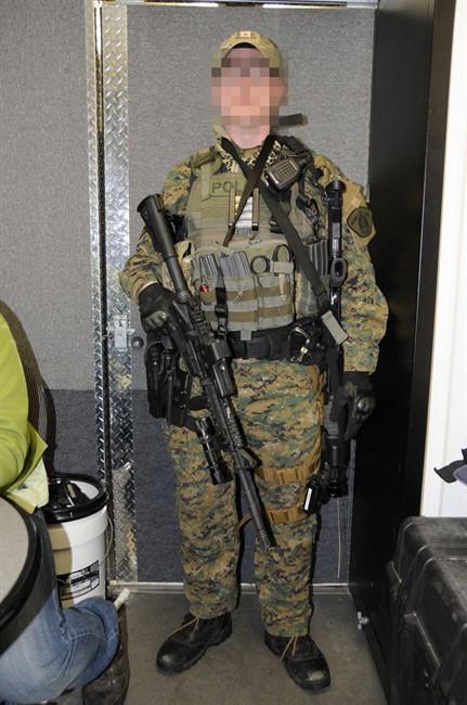 RCMP ERT member from Prince George, BC, 2009, wearing MARPAT, the camo pattern used by the US Marine Corps, armed with C8 carbine.   Conspiracy theorists would probably assert the US Marine Corps had invaded Canada…