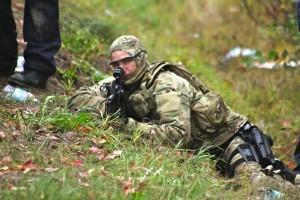 RCMP ERT member providing cover fire for Tactical Troop, Oct 17, 2013.