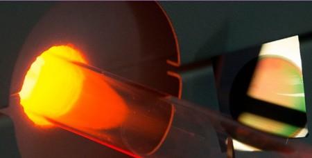 Silicon chip with porous surface next to the special furnace where it was coated with graphene to create a supercapacitor electrode.