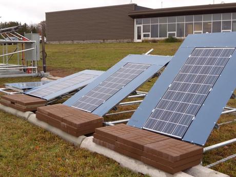 An experimental array of solar panels at Michigan Technological University’s Keweenaw Research Center, where it typically snows over 200 inches annually. Researchers aim to determine which angle yields the most electricity over the course of a year.