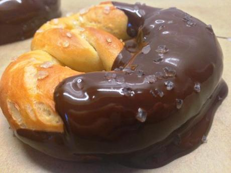 salted pretzel dripping with dark chocolate finished with rock salt flakes