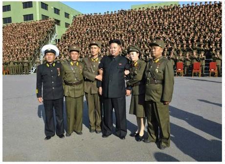 Kim Jong Un (4th L) poses for a commemorative photo in Pyongyang on 23 October 2013 with participants in the 4th Meeting of KPA Company Commanders and Political Instructors (Photo: Rodong Sinmun).