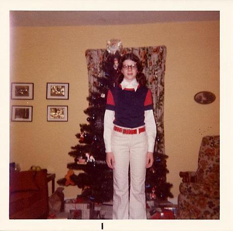 Girl in front of Christmas tree, circa 1975