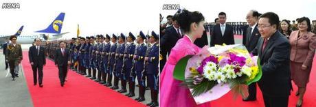 Mongolian President Tsakhiagiin Elbegdorj reviews an honor guard of the KPA and Worker-Peasant Red Guards (L) and receives a floral bouquet after arriving in Pyongyang on 28 October 2013 (Photo: KCNA).