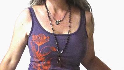 evolution now poppy bee tank and padlock necklace.