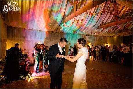 Bride and groom colourful first dance at barmbyfield Barn