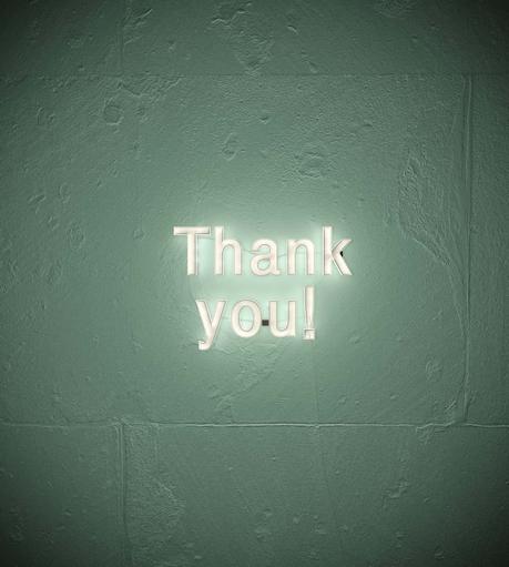 thank you sign on a wall
