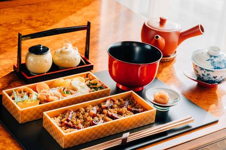 a tray of japanese food 