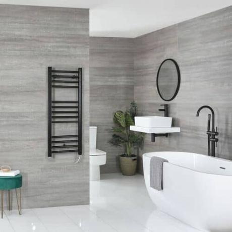 milano nero black electric heated towel rail in a bathroom
