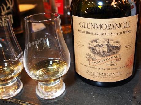 White background tasting shot with the Glenmorangie Traditional 100 Proof and a glass of whiskey next to it.
