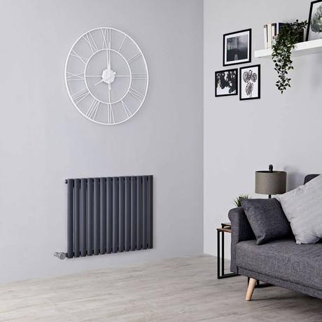 Milano Aruba Black Horizontal Radiator in living room setting