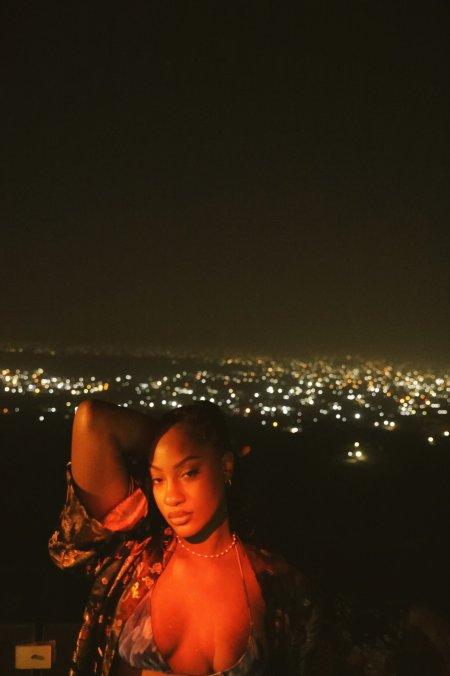 Singer Tems Shows Off Cleavage In New Photos