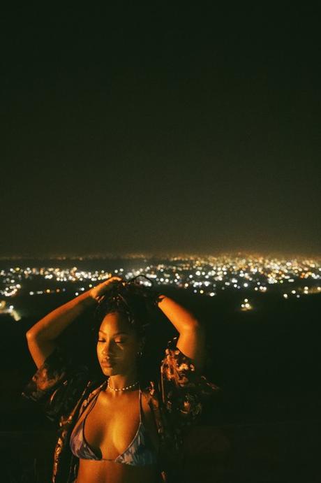 Singer Tems Shows Off Cleavage In New Photos