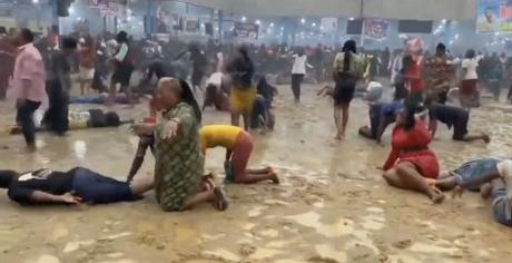 Church Members Roll In Mud Water After Falling Under Anointing (Video)