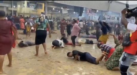Church Members Roll In Mud Water After Falling Under Anointing (Video)