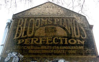 Blooms Pianos, Kingsland Road – two signs and at least four workshops