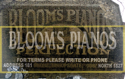 Blooms Pianos, Kingsland Road – two signs and at least four workshops