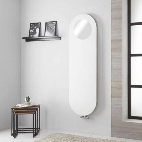 White Vulcano Mirrored Designer Radiator in a living space