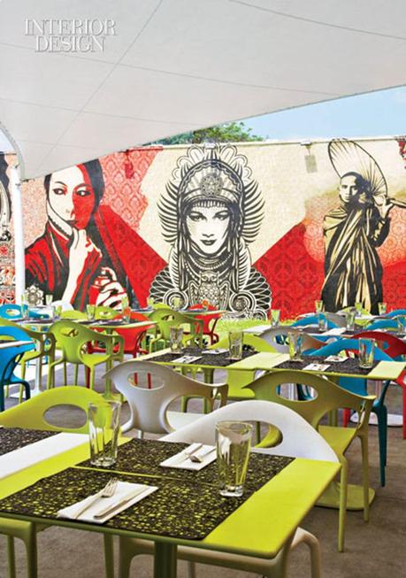 367090-On_the_patio_at_the_Wynwood_Kitchen_and_Bar_Ross_Lovegrove_s_tables_and_chairs_set_off_Shepard_Fairey_s_Wynwood_Walls_mural_in