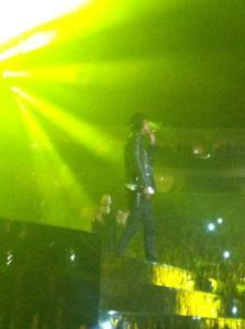 Drake and Wiz Khalifa hang out on stage in Pittsburgh, bathed in black and yellow lights for Wiz's anthemic 