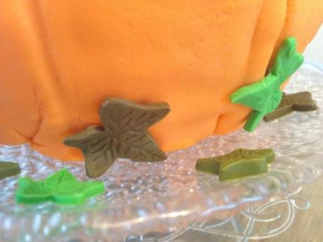 leaf decorations on halloween pumpkin cake shades of green