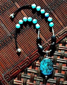 Photo of beaded glass and stone pendant necklace