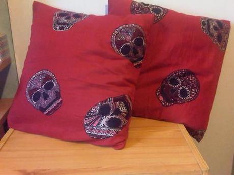 So what does a young designer do when she goes shopping and falls in love with a printed scarf that she will never wear?
She buys it, takes it to the studio, cuts it up and turns it into fantastic cushion covers of-course!!! Perfect for Halloween/Day of the dead & the scull print matches my slightly Gothic bedroom to perfection.
Yet another great aspect of being a designer! I now have custom made cushions which took me a total of about 30 minutes to create, with no pattern making, no hand stitching, no chalk markings, nothing.
xoxo LLM
Scarf available at H&M stores in Europe. 