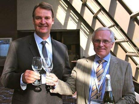 Halliburton Canada vice-president John Gorman (left) and Michael Binnion, President of QOGA and CEO of Questerre Energy Corp., drank fracking fluid at a Quebec industry event earlier this week.