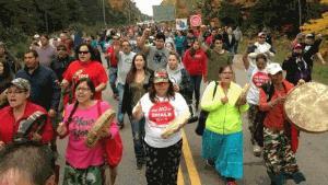 Anti-shale gas protesters marched on Route 134 in Rexton on Oct. 1, 2013. (Jennifer Choi/CBC)