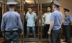 Defendants and guards look on during the ‘Bolotnaya Square’ trial