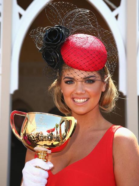  Kate Upton poses with the Melbourne Cup during Melbourne Cup Day at Flemington Racecourse on November 5, 2013 in Melbourne, Australia.  (Photo by Ryan Pierse/Getty Images)