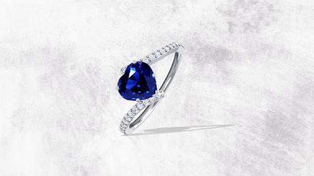 Heart Shape Blue Sapphire Bypass Ring With Prong Set Round Diamonds