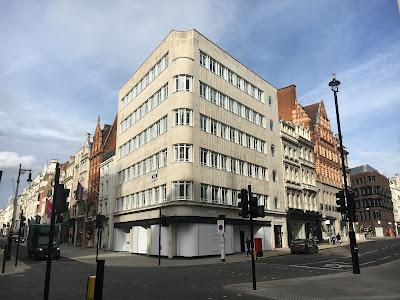 Criminal loss of curved Art Deco windows at Balenciaga, New Bond Street