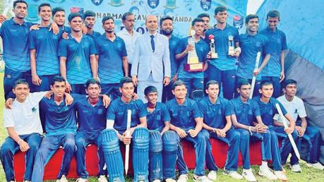 Sri Devananda cricket team with the champions trophy     