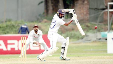 Opener Oshada Fernando plays a shot during their practice match yesterday. (Pic courtesy BCB)