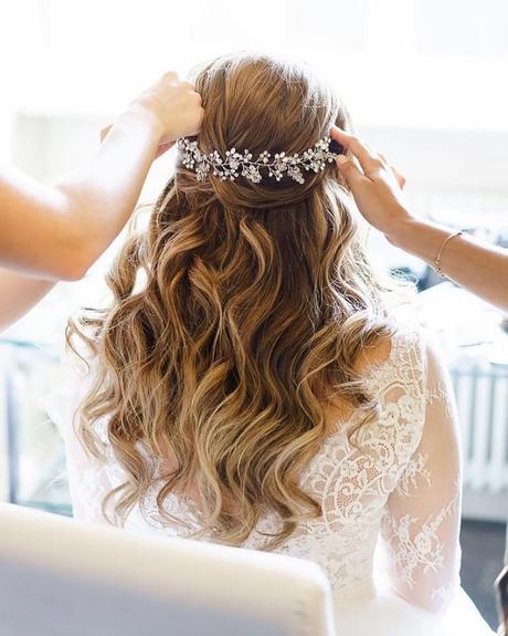 winter wedding hairstyles hail up flowers in hair slmakeupandhair