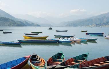 Lake with boats in Pokhara, nepal vacation