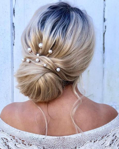 spring wedding hairstyles elegant low bun alexandralee1016