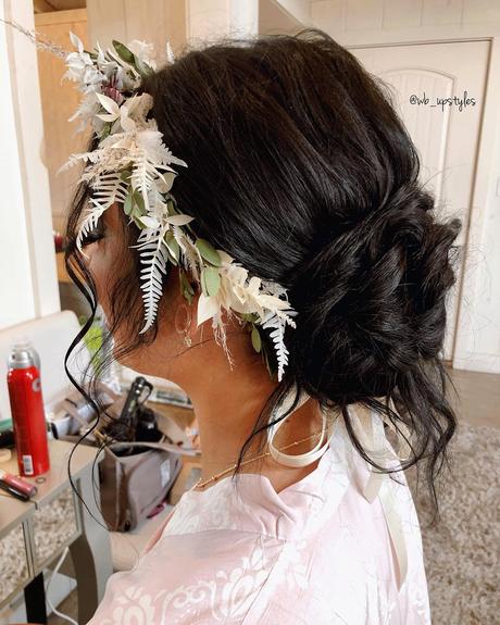 spring wedding hairstyles slightly messy low bun with flower crown wb_upstyles