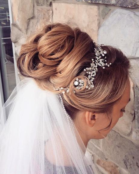 spring wedding hairstyles high bun with veil updosbykarina