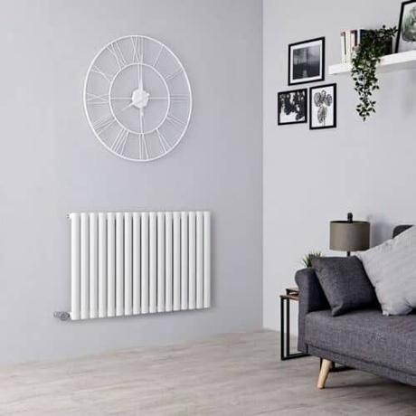 milano aruba electric radiator in a gray living room