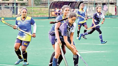 Sri Lankan women's hockey players  during a  match