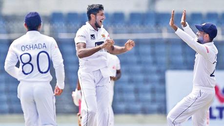 Kasun Rajitha celebrating a wicket.