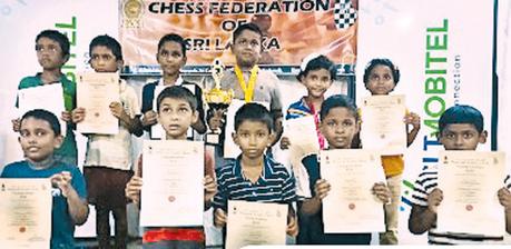 The winners of the National Youth Championship (under 8) pose with their certificates. 