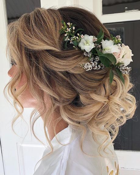 beach wedding hairstyles messy updo with flowers deelushhair