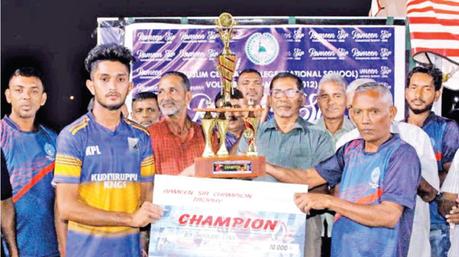 Skipper of the champions Ozone SC Volleyball team receiving the trophy.